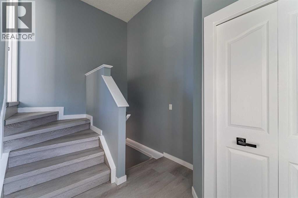 Single Family House Bi-level for Sale in  Erin Meadow Crescent SE Erin Woods Calgary 