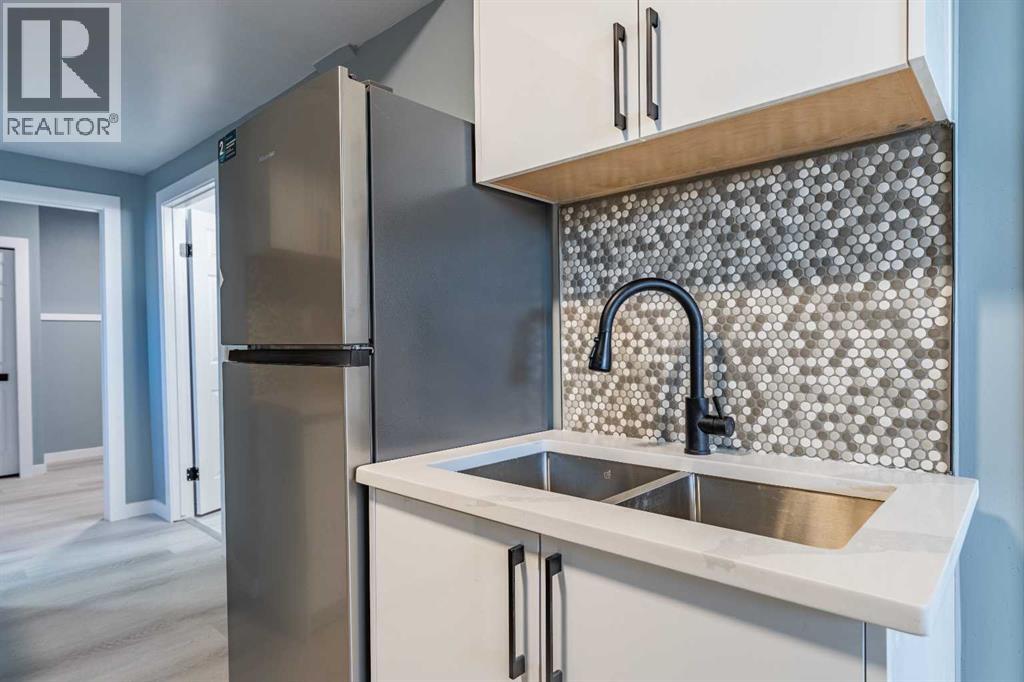 Single Family House Bi-level for Sale in  Erin Meadow Crescent SE Erin Woods Calgary 