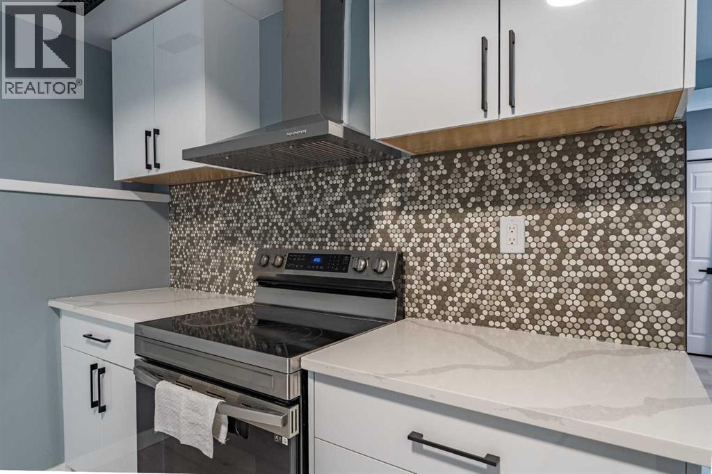 Single Family House Bi-level for Sale in  Erin Meadow Crescent SE Erin Woods Calgary 