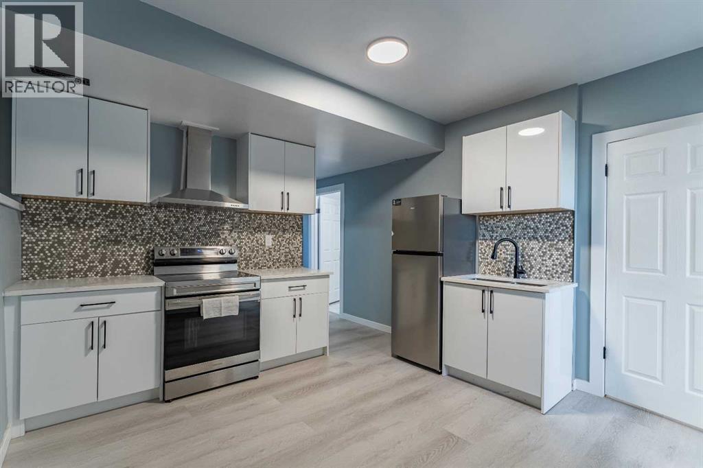 Single Family House Bi-level for Sale in  Erin Meadow Crescent SE Erin Woods Calgary 