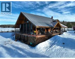 Front exterior of 12090 BUCKHORN LAKE ROAD · Prince George, BC