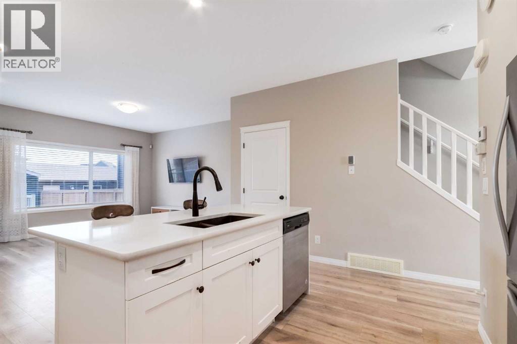 Single Family House for Sale in  Belmont Drive SW Belmont Calgary 