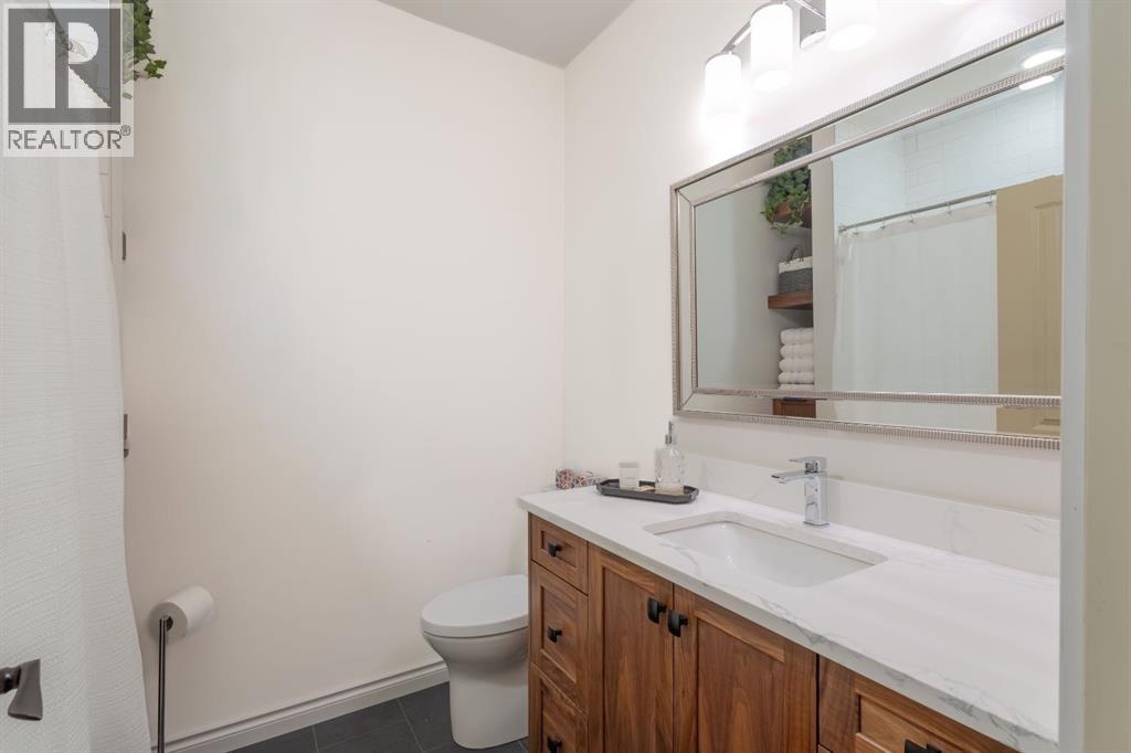 Single Family House Bi-level for Sale in  Hawkland Place NW Hawkwood Calgary 