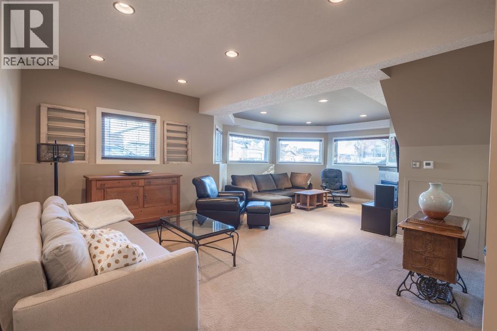 Single Family House Bi-level for Sale in  Hawkland Place NW Hawkwood Calgary 