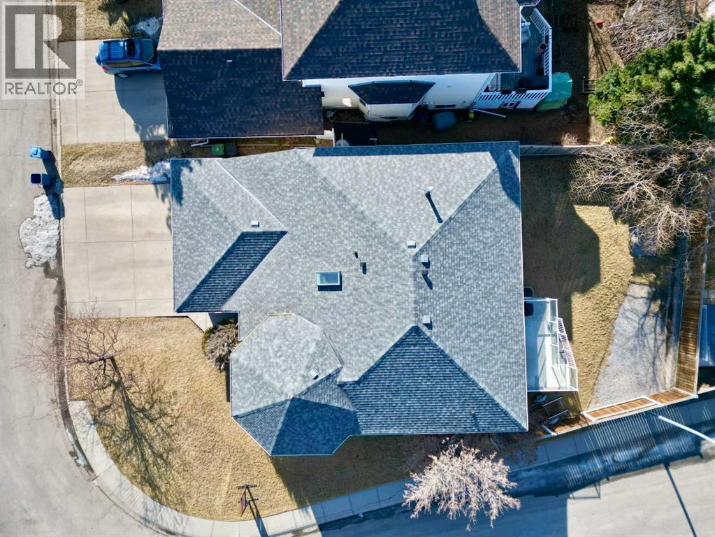 Single Family House Bi-level for Sale in  Hawkland Place NW Hawkwood Calgary 