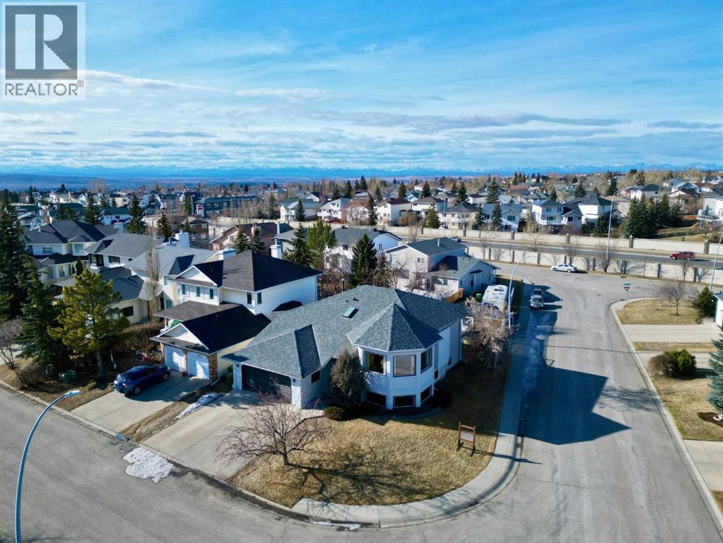 Single Family House Bi-level for Sale in  Hawkland Place NW Hawkwood Calgary 