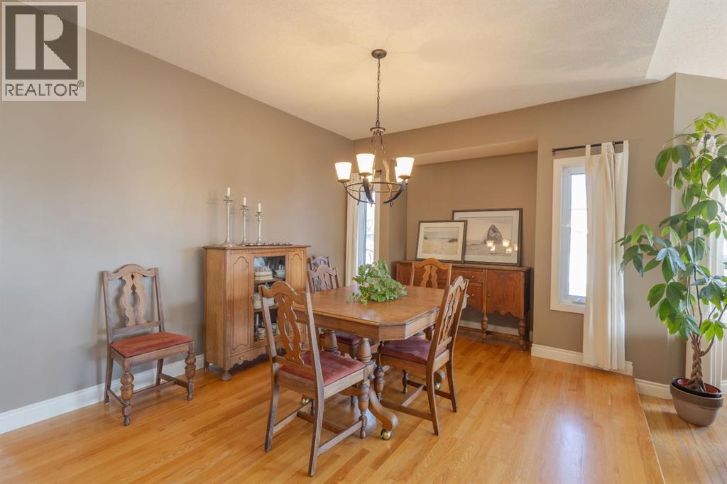 Single Family House Bi-level for Sale in  Hawkland Place NW Hawkwood Calgary 