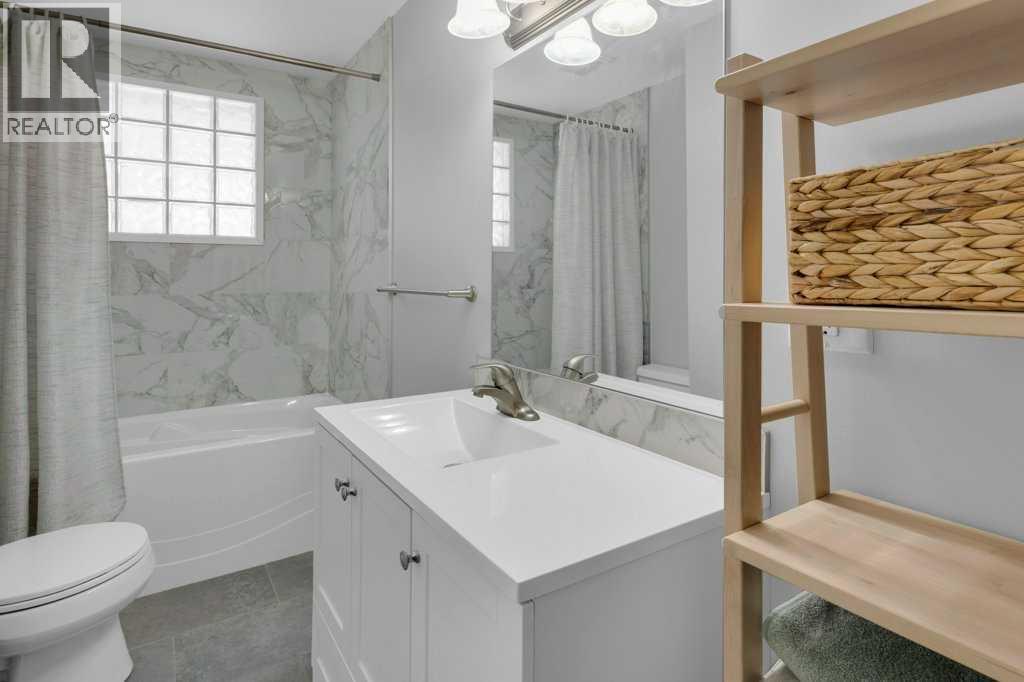 Multi-family House Bi-level for Sale in /  Avenue NW Bowness Calgary 