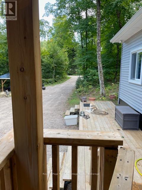 Photo of deck in the summer provided by Owner.