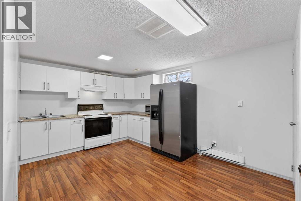 Single Family House Bi-level for Sale in  Pinepoint Drive NE Pineridge Calgary 