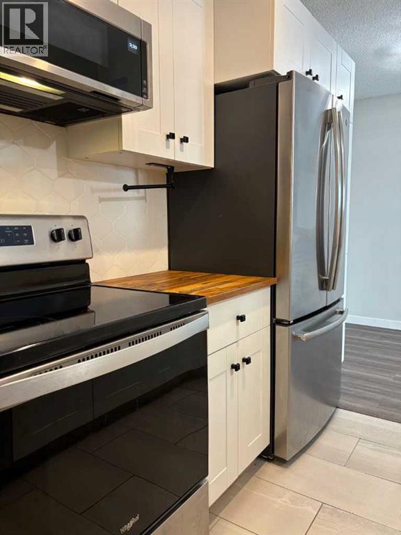 Single Family House for Sale in    Avenue Mountview Grande Prairie 