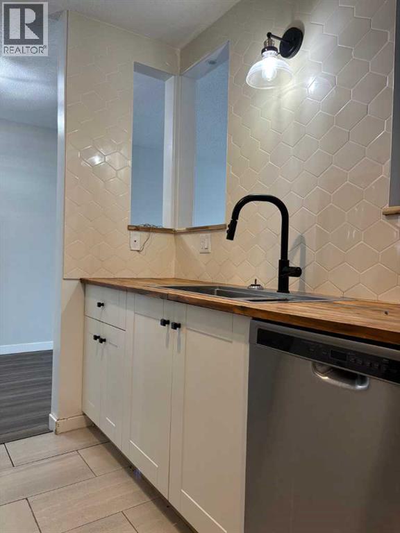 Single Family House for Sale in    Avenue Mountview Grande Prairie 