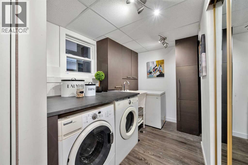 Single Family House Bi-level for Sale in  Bearspaw Drive NW Brentwood Calgary 