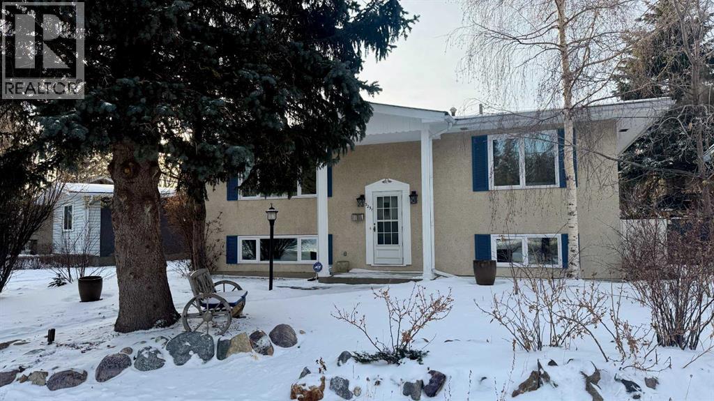 Single Family House Bi-level for Sale in  Bearspaw Drive NW Brentwood Calgary 