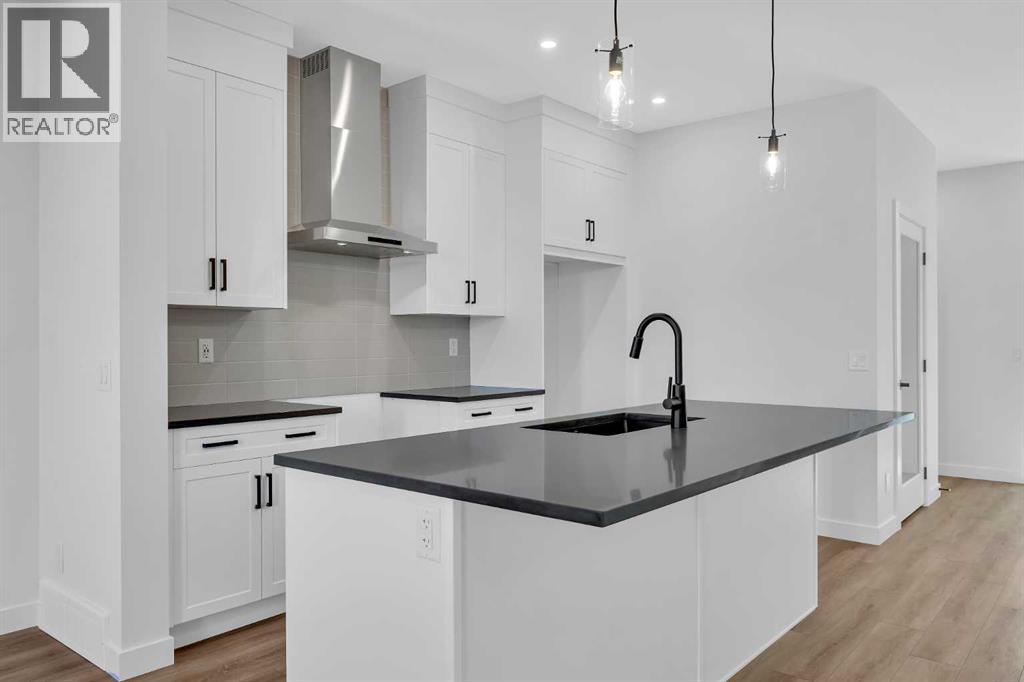 Single Family House for Sale in  Versant Path SW Alpine Park Calgary 