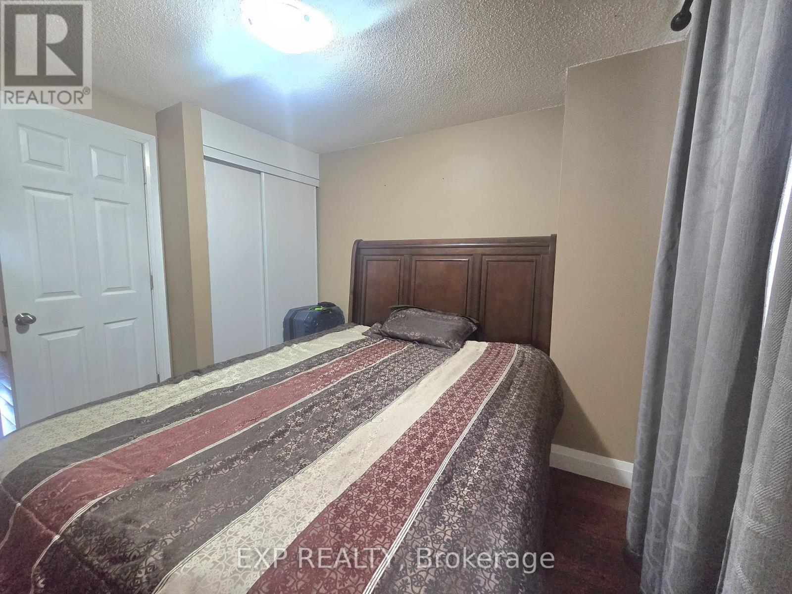 #44 700 HARMONY ROAD N - 18
