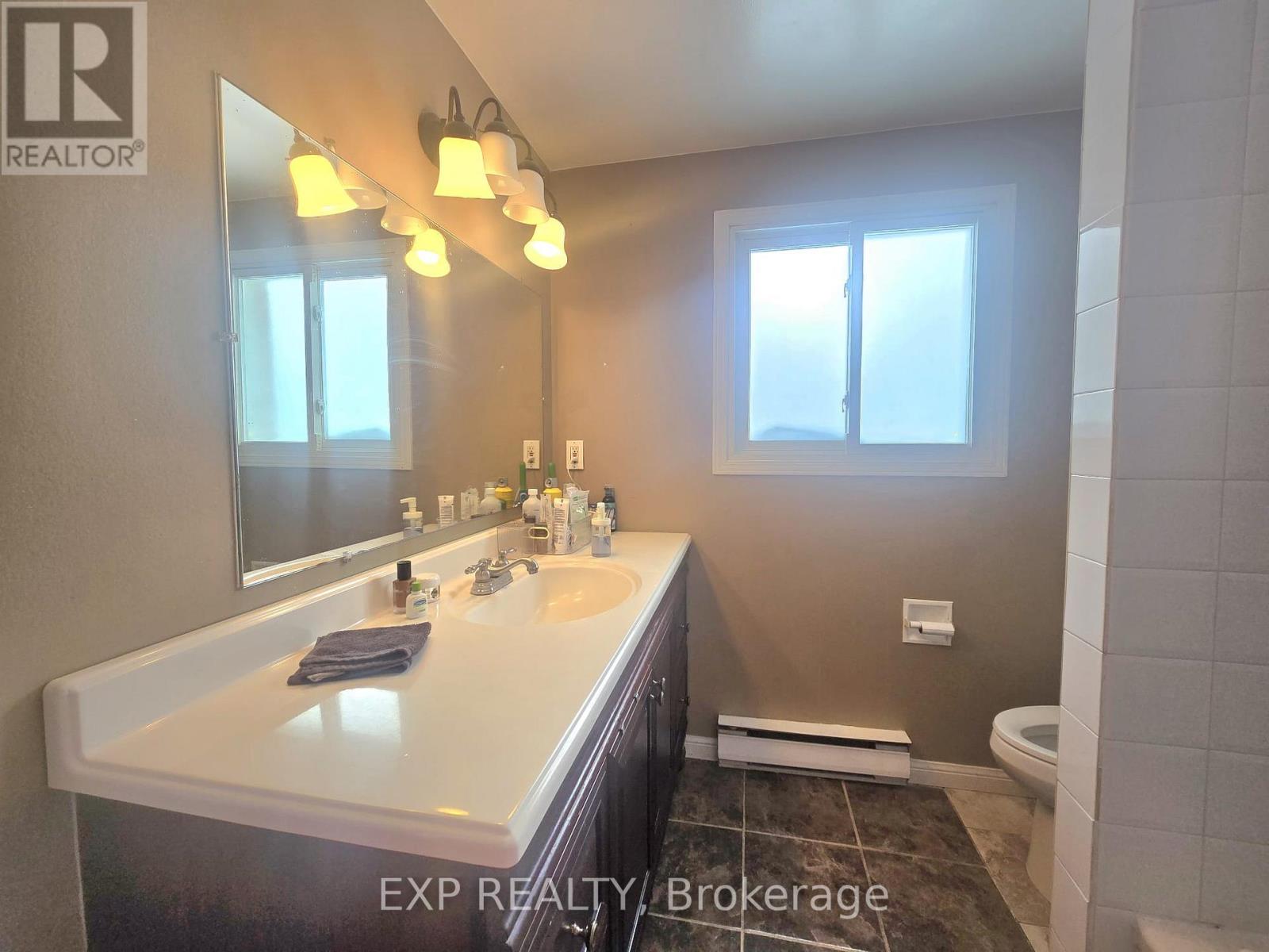 #44 700 HARMONY ROAD N - 19