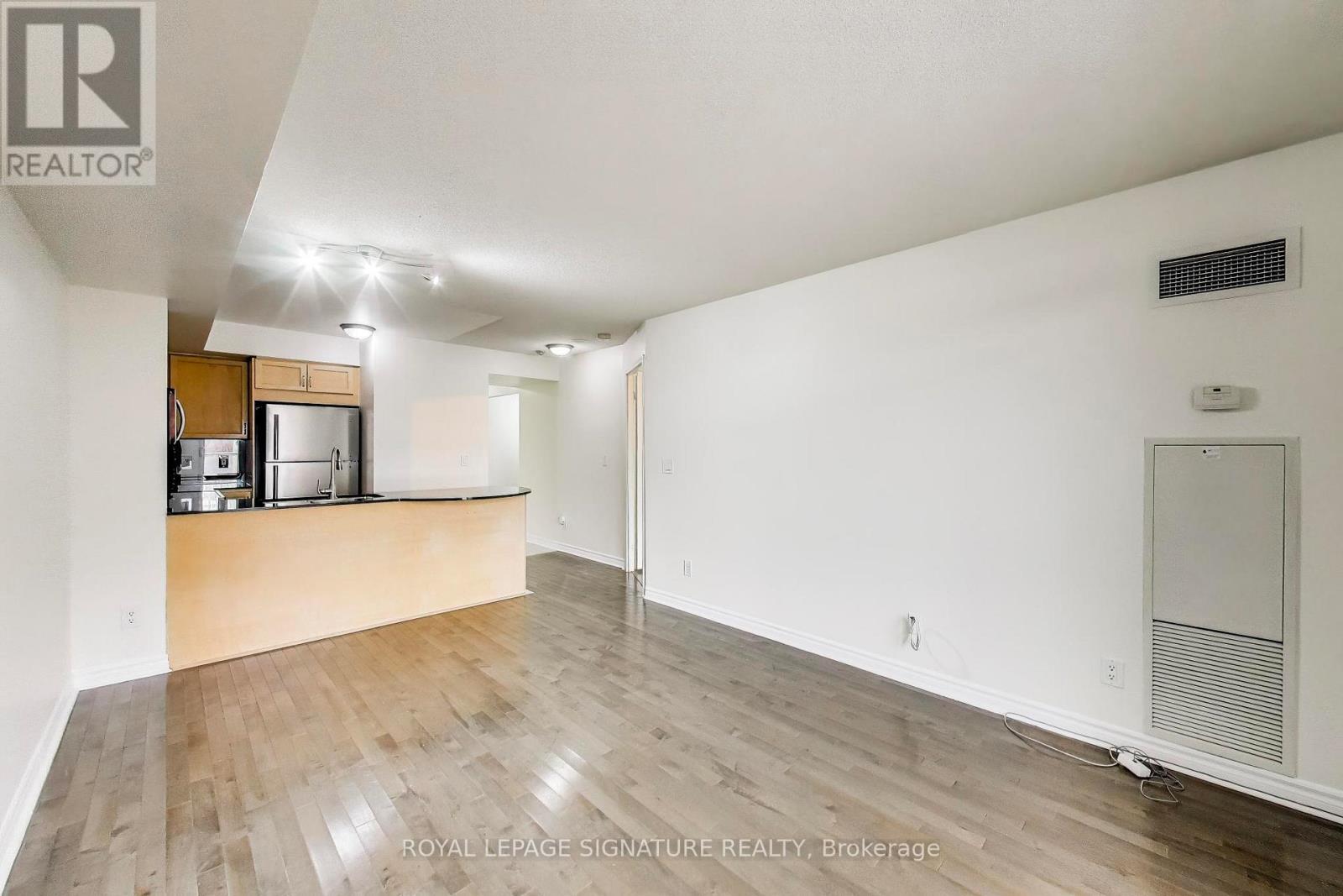 #203 18 KENASTON GARDENS - 1