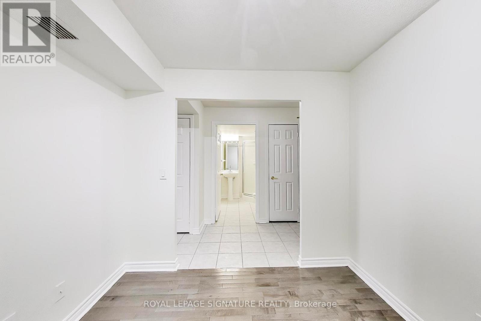 #203 18 KENASTON GARDENS - 18