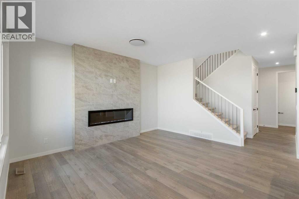 Single Family House for Sale in  Belmont Place SW Belmont Calgary 