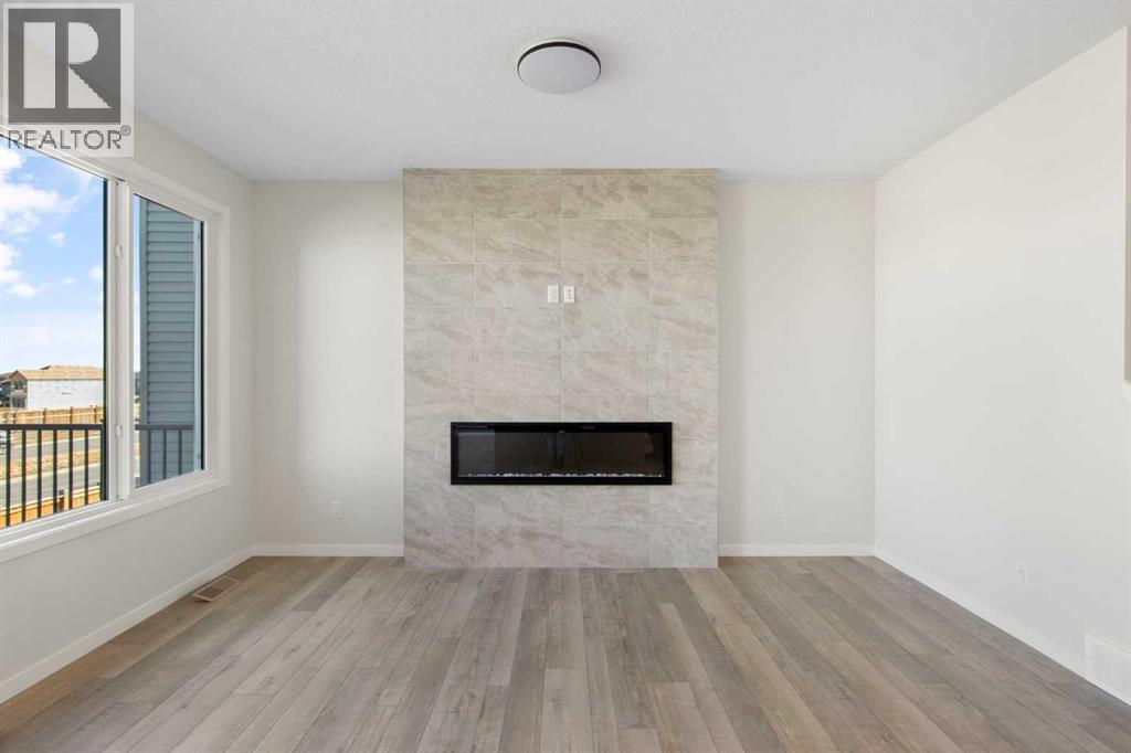 Single Family House for Sale in  Belmont Place SW Belmont Calgary 