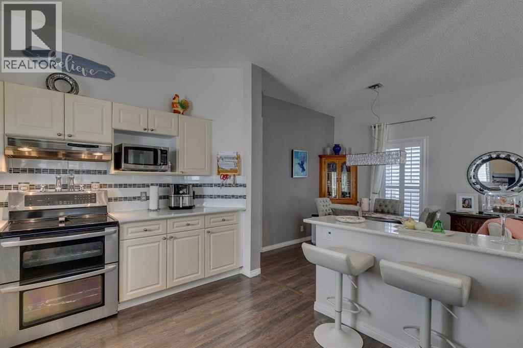 Single Family House Bi-level for Sale in  Tuscany Valley Drive NW Tuscany Calgary 