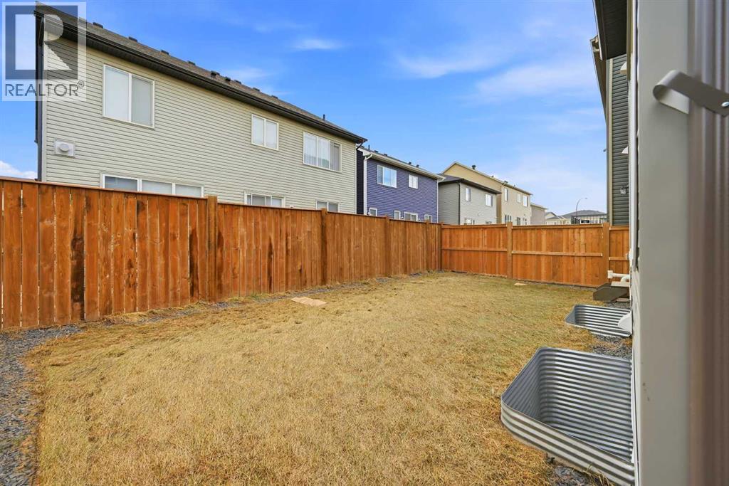 Single Family House for Sale in  Carringham Road Carrington Calgary 