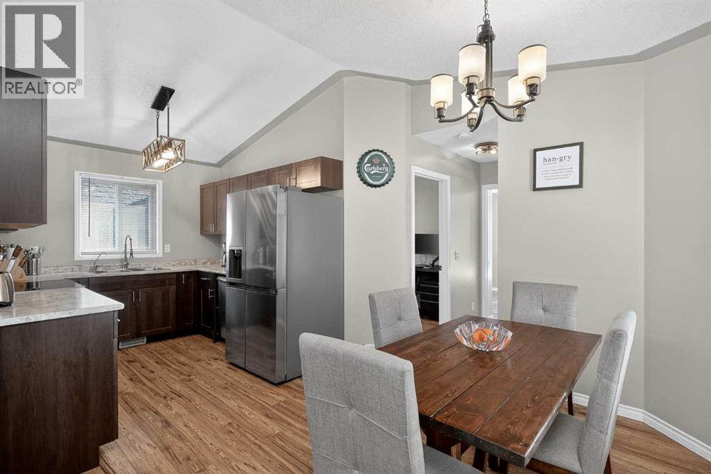 Single Family House Bi-level for Sale in  Mt Allan Circle SE McKenzie Lake Calgary 