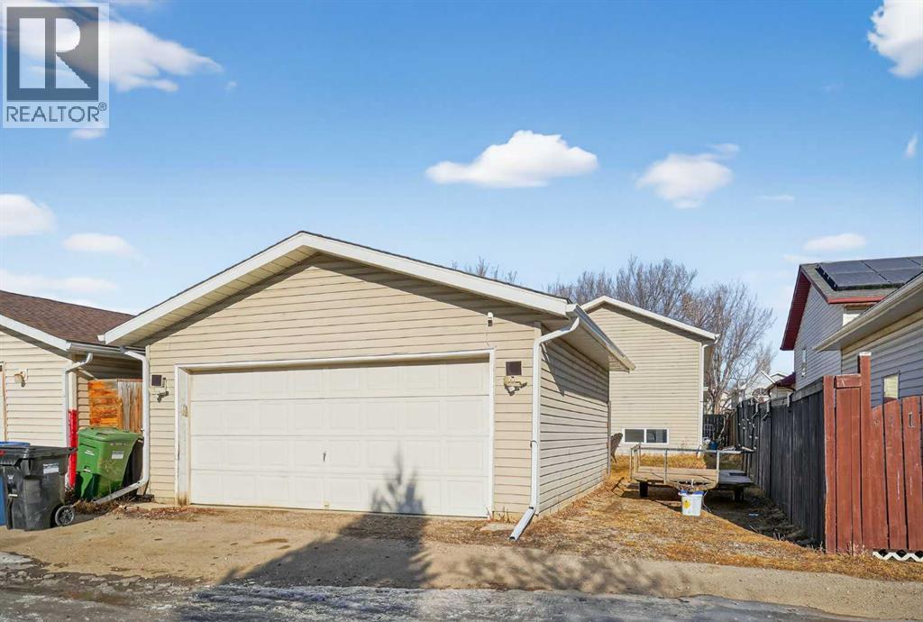 Single Family House Bi-level for Sale in  Mt Allan Circle SE McKenzie Lake Calgary 