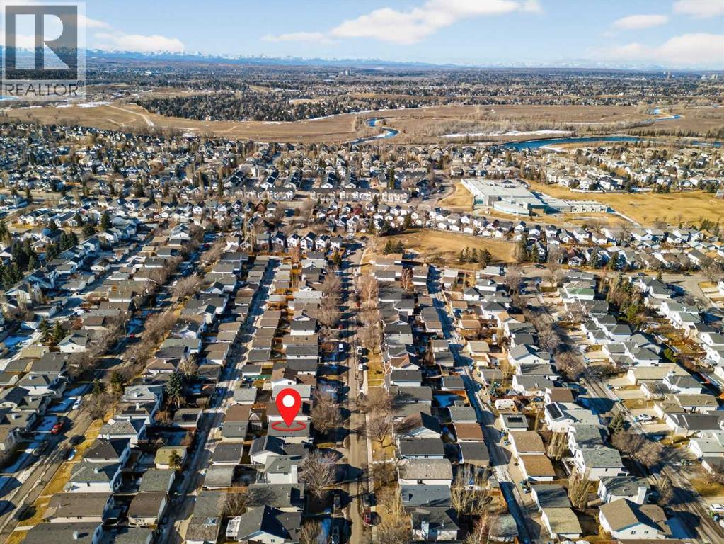 Single Family House Bi-level for Sale in  Mt Allan Circle SE McKenzie Lake Calgary 