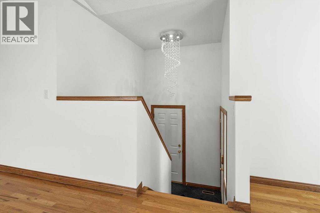 Single Family House Bi-level for Sale in  Scurfield Drive NW Scenic Acres Calgary 