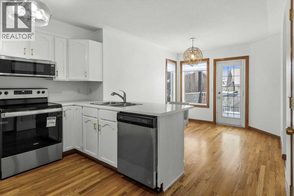 Single Family House Bi-level for Sale in  Scurfield Drive NW Scenic Acres Calgary 