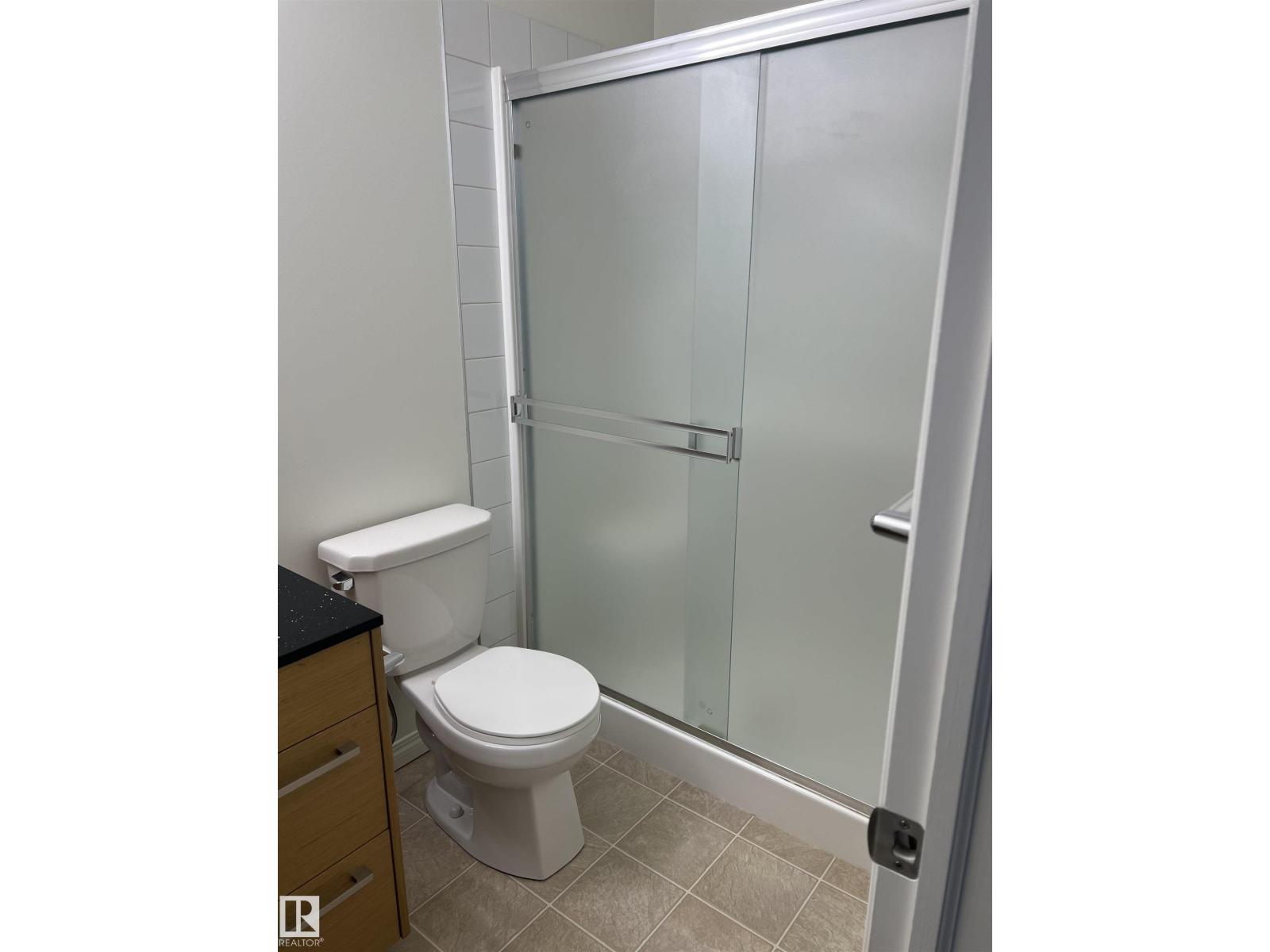 #2403 7343 SOUTH TERWILLEGAR DR NW - 2
