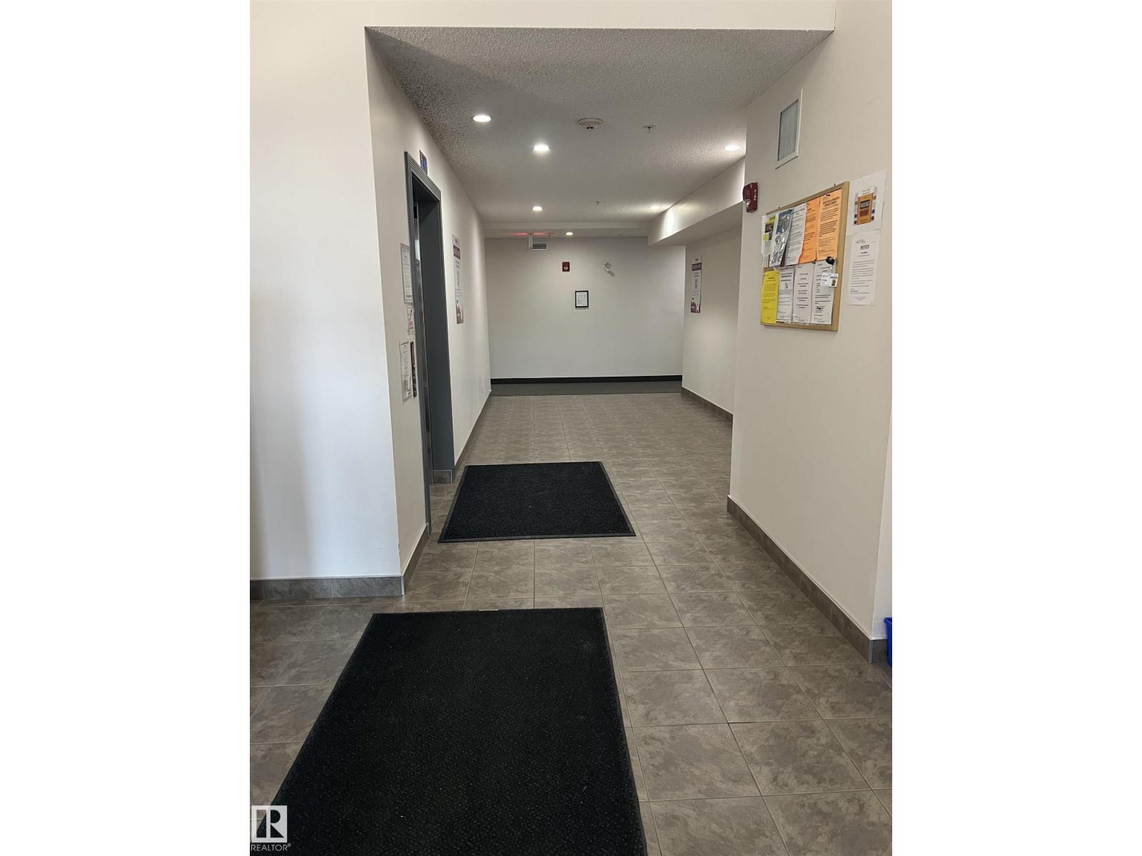 #2403 7343 SOUTH TERWILLEGAR DR NW - 24
