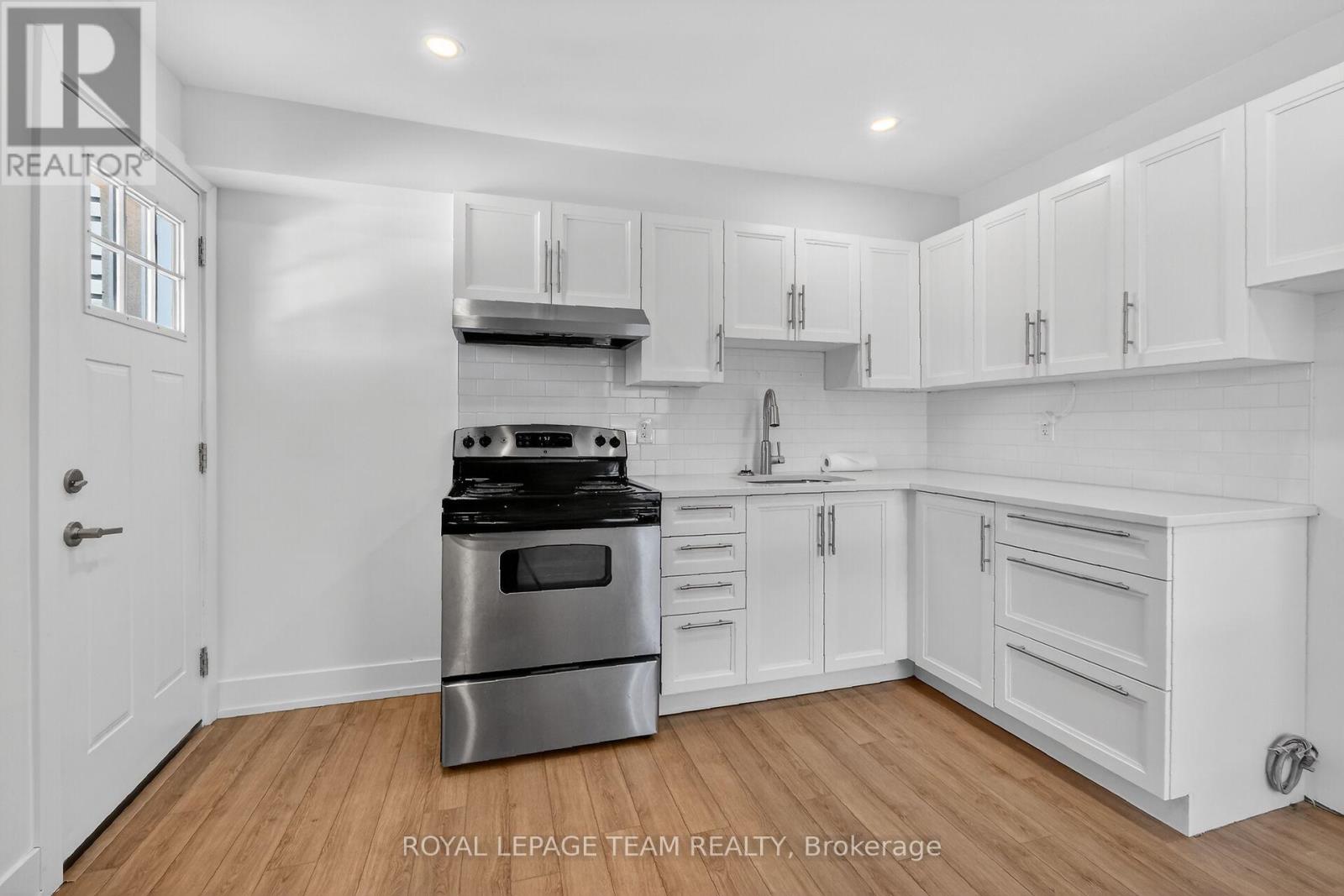 Beautifully redesigned kitchen w/new cabinetry