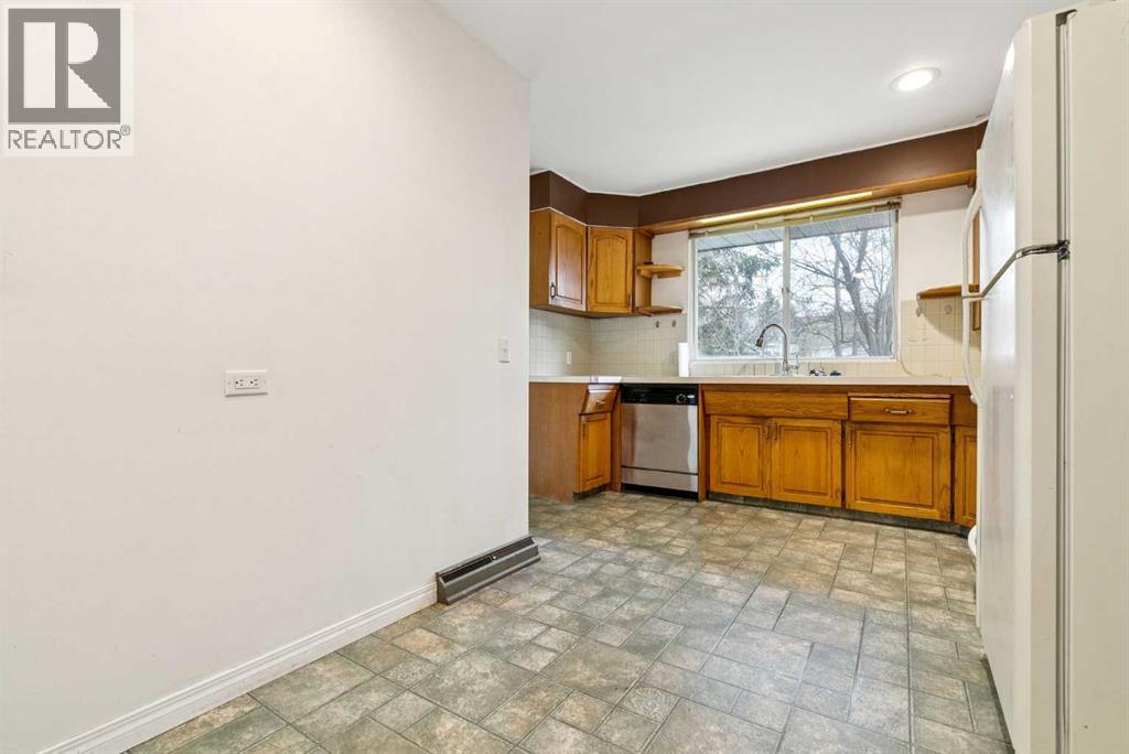 Single Family House Bungalow for Sale in  Bearspaw Drive NW Brentwood Calgary 