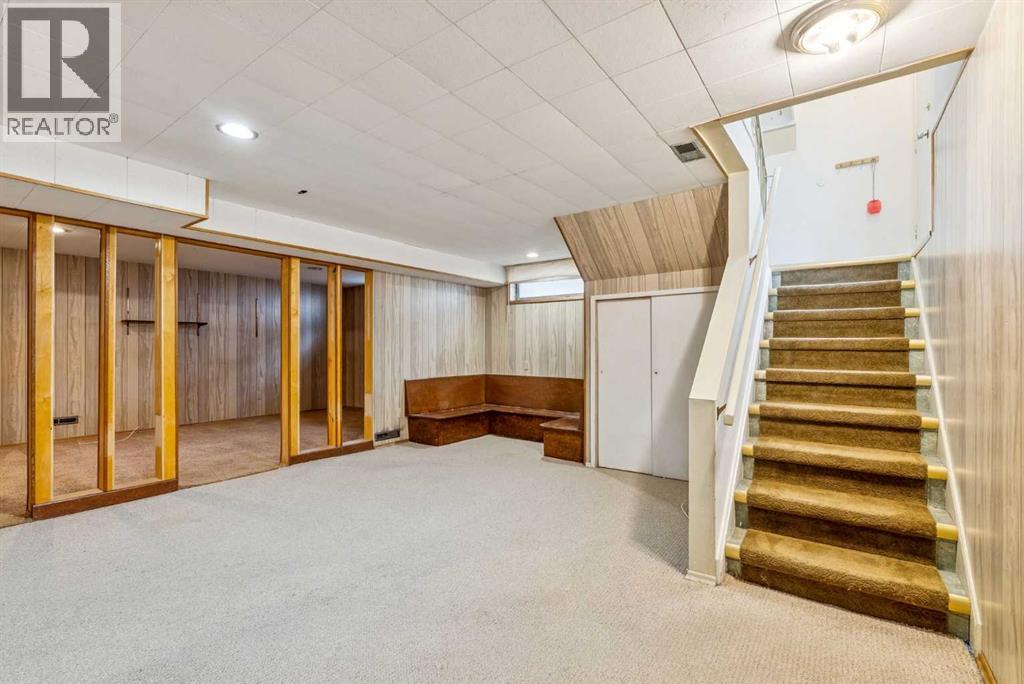 Single Family House Bungalow for Sale in  Bearspaw Drive NW Brentwood Calgary 