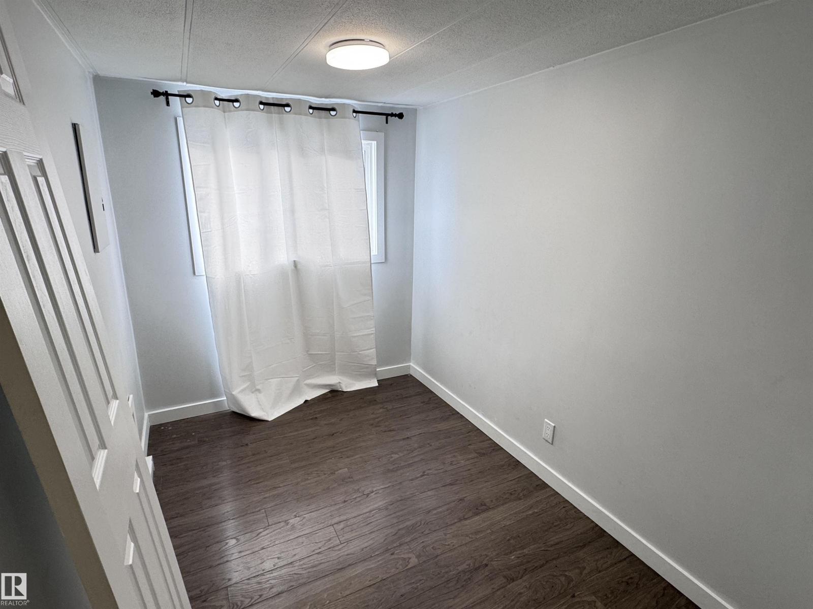 #68 9501 104 AV - Photo 3 of 22, Westlock, Alberta