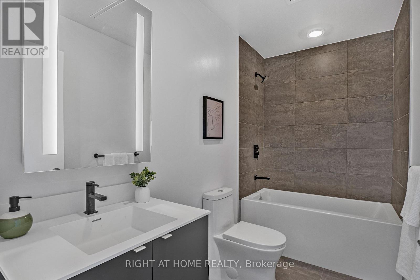 #209 500 DUPONT STREET - 24