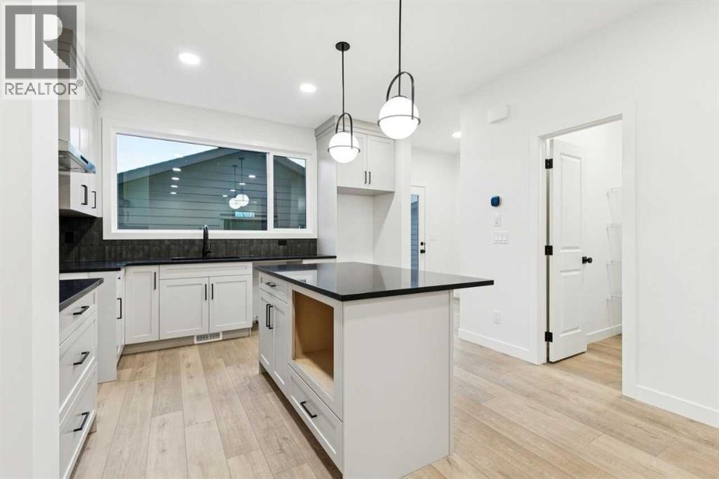 Single Family House for Sale in   Street SW Alpine Park Calgary 