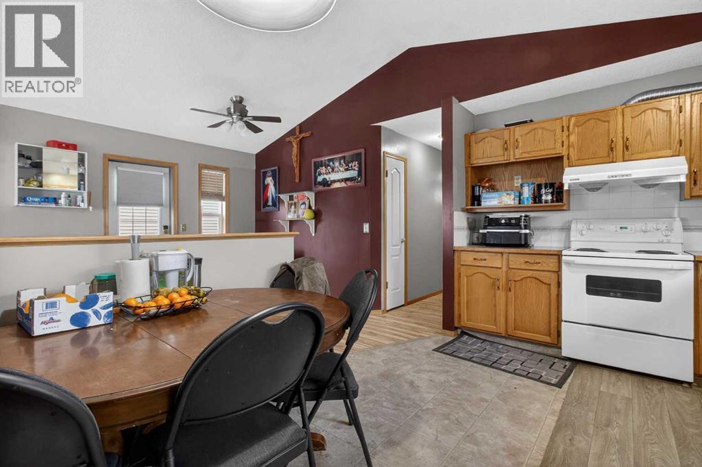 Single Family House Bi-level for Sale in  Erin Circle SE Erin Woods Calgary 