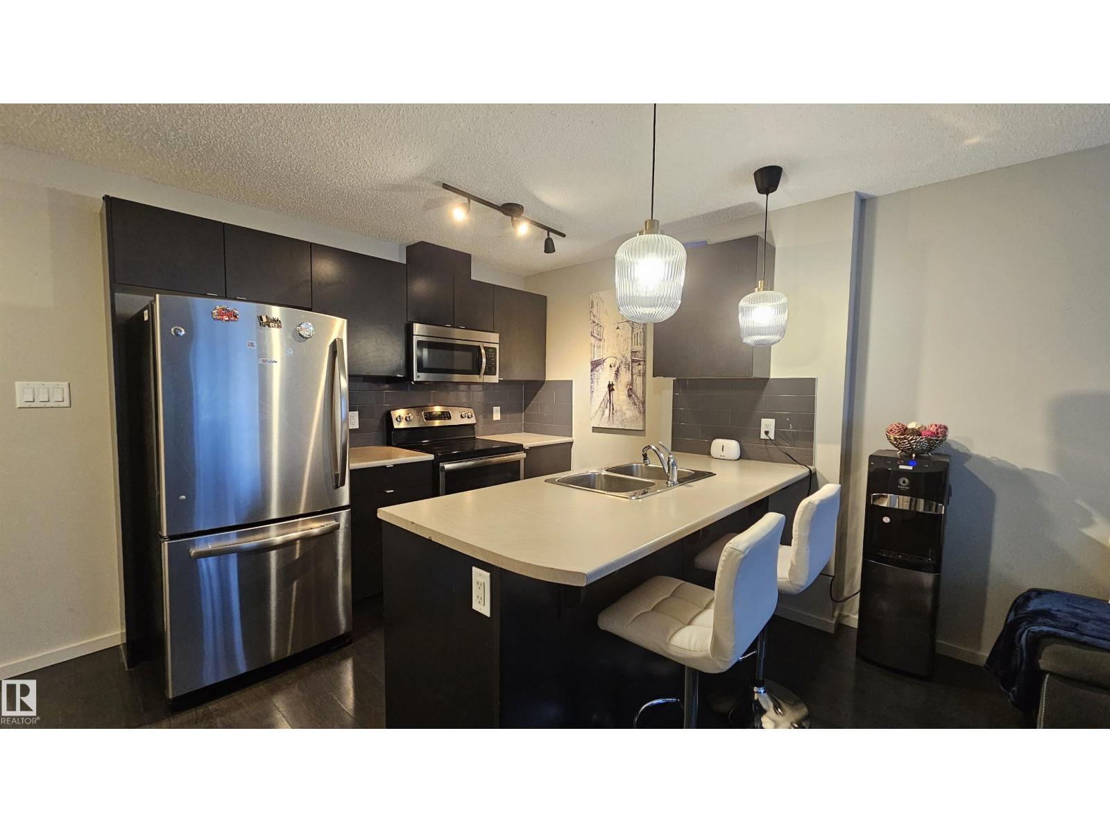 #444 348 WINDERMERE RD NW - 1