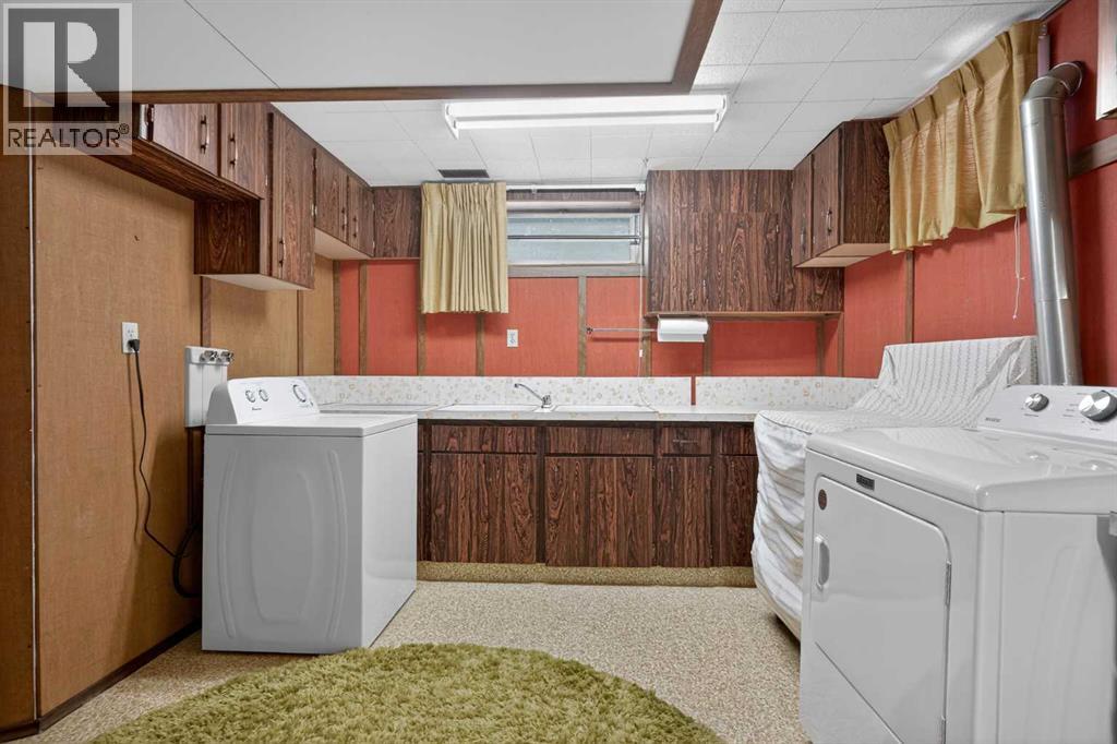 Single Family House Bungalow for Sale in  Capri Avenue NW Brentwood Calgary 