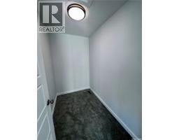 Family room - 1123 Camden Gardens, White City, SK S4L0G1 Photo 12