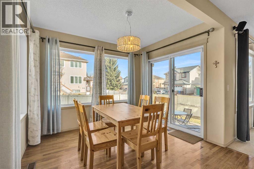 Single Family House for Sale in  Everwillow Close SW Evergreen Calgary 
