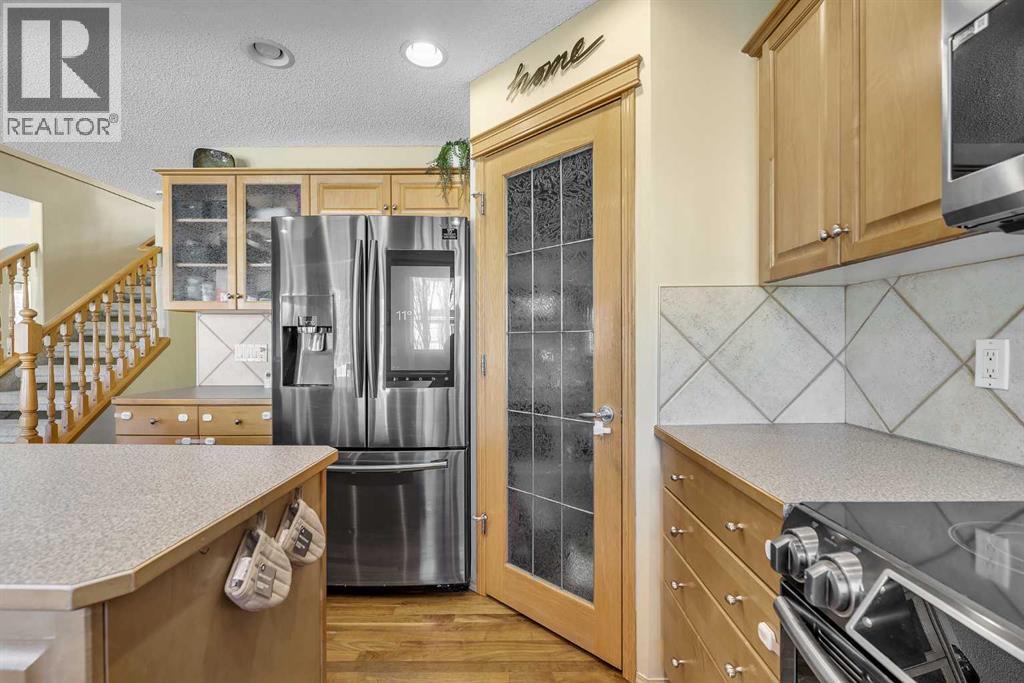 Single Family House for Sale in  Everwillow Close SW Evergreen Calgary 