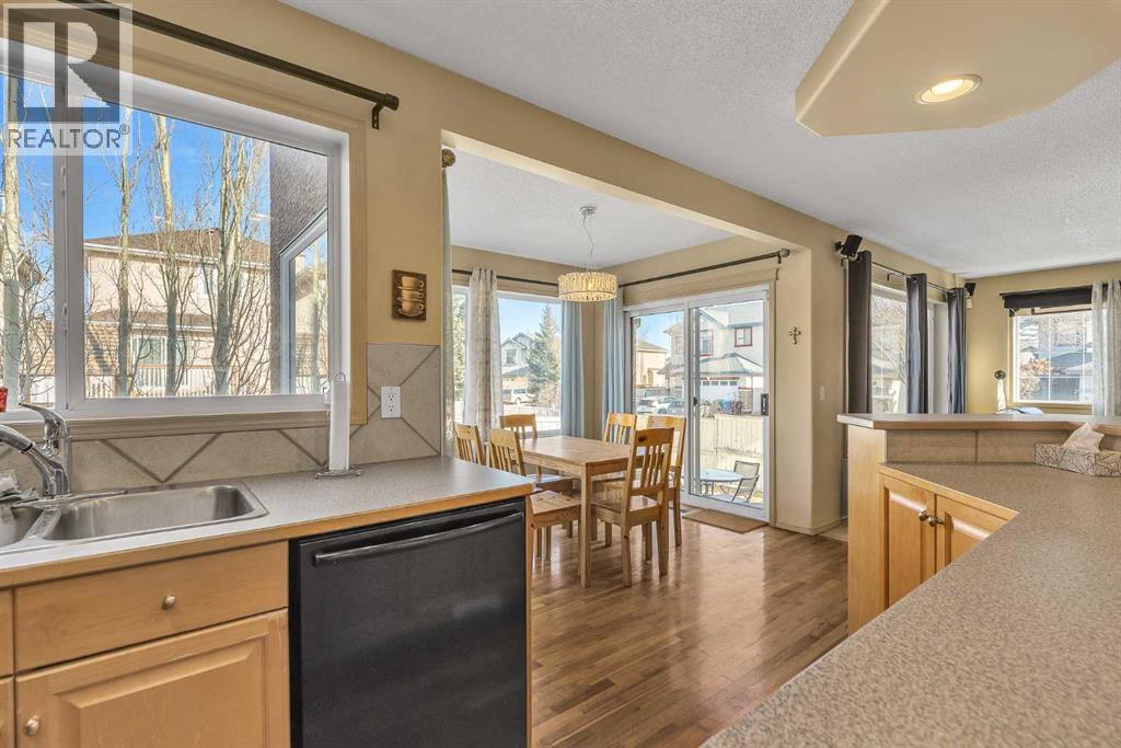 Single Family House for Sale in  Everwillow Close SW Evergreen Calgary 