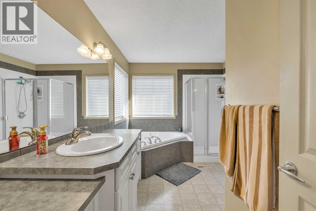 Single Family House for Sale in  Everwillow Close SW Evergreen Calgary 