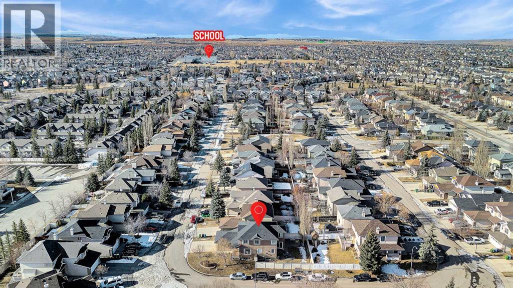 Single Family House for Sale in  Everwillow Close SW Evergreen Calgary 