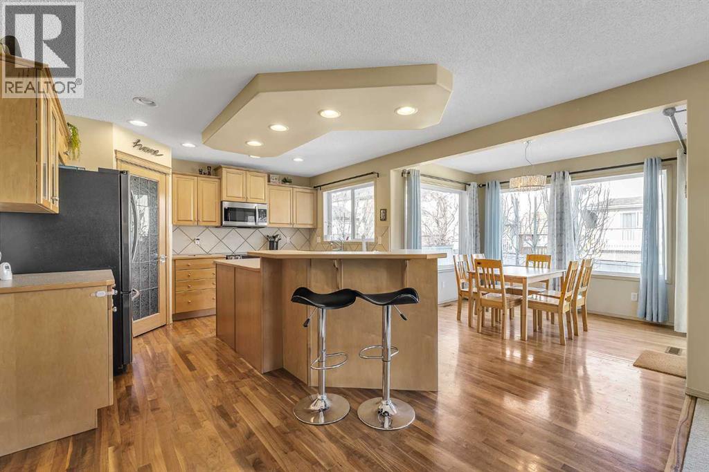 Single Family House for Sale in  Everwillow Close SW Evergreen Calgary 